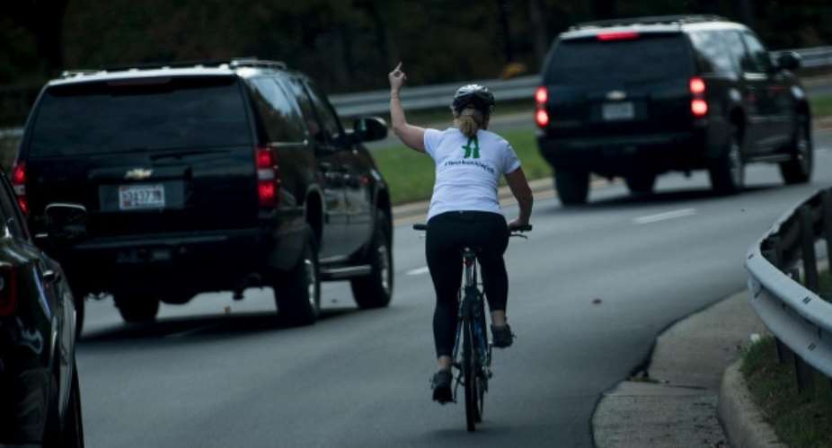 This action cost Juli Briskman the job: as the President's motorcade drove past her, she showed the finger of stink