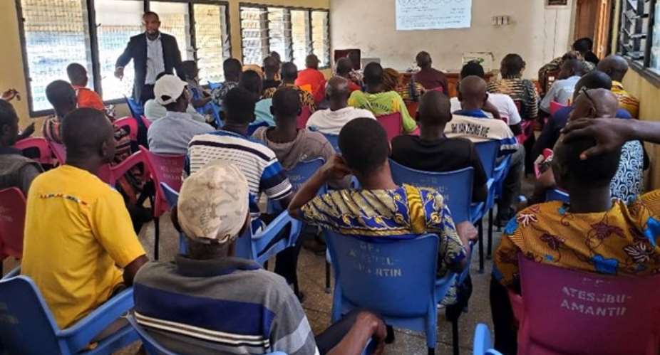 MR. BUKARI (STANDING) STRESSING A POINT AT THE ENGAGEMENT