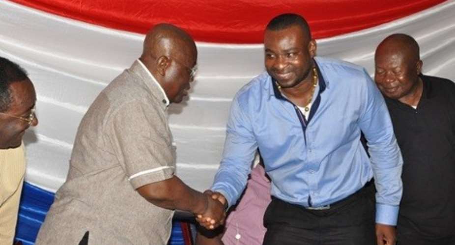 Wontumi in a handshake with President Akufo Addo