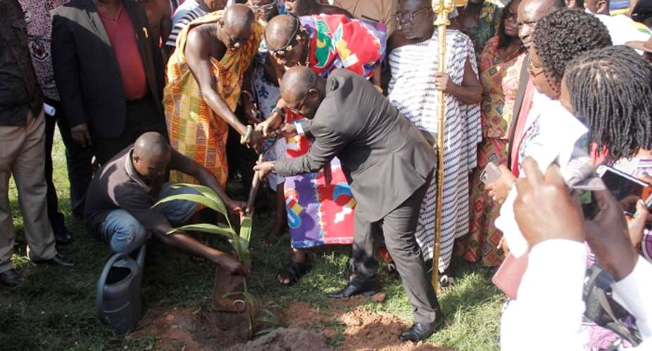 Prof. Ebenezer Oduro Owusu right being assisted by Daasebre Prof. Emeritus Oti Boateng and other dignitaries in turning the sod for the project