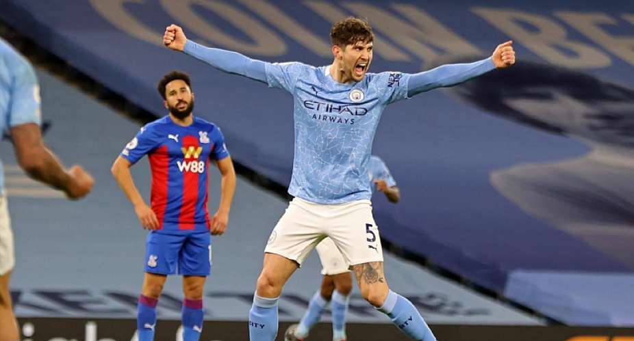 Manchester City's English defender John Stones celebrates after scoring their third goal during the English Premier League football match between Manchester City and Crystal Palace at the Etihad StadiumImage credit: Getty Images