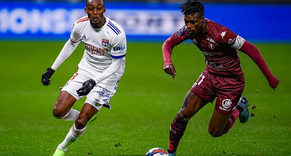 Ghana defender John Boye right in action for FC Metz against Lyon on Sunday. Photo CreditFC Metz
