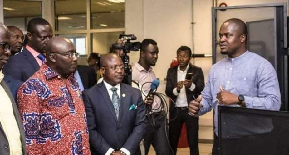 Yayra Koku, explaining a point to Dr. Mahamudu Bawumia then Vice President