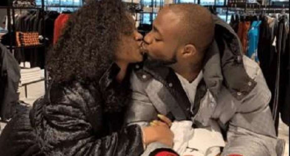 Davido plants a true loves kiss on the lips of Chioma