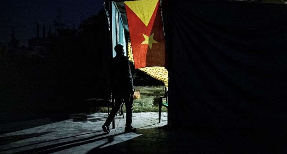 A man enters a polling station for Tigray's regional elections, which Prime Minister Abiy Ahmed deemed illegal.  - Source: EDUARDO SOTERAS/AFP via Getty Images