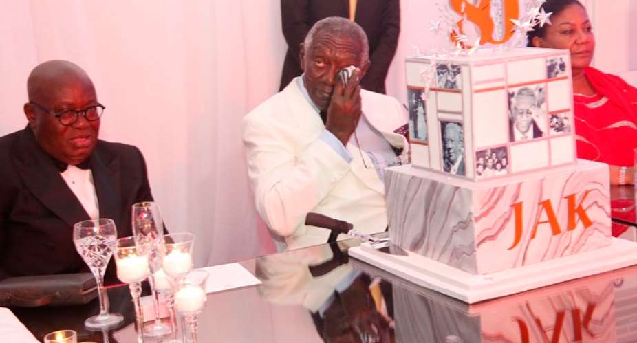 Former President Kufuor shedding tears of joy at the ceremony. With him are President Akufo-Addo and wife Rebecca