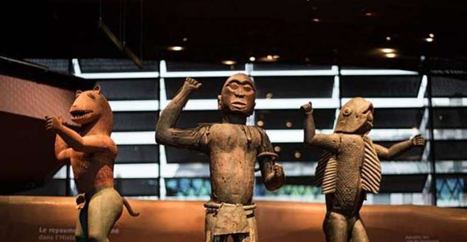 Royal statues, Dahomey, Republic of Benin, now in Muse du Quai Branly, Paris, France. Left, King Gll, half-lion, half- man. Centre, King Ghzo, half-bird, half-man. Right, King Bhanzin, half-shark, half-man. To be returned soon to Republic of Benin.