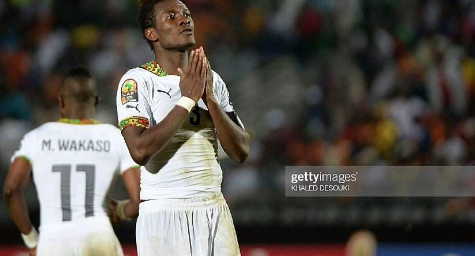 Ghana's forward Asamoah Gyan reacts after missing a goal opportunity during the 2015 African Cup of Nations group C football match between South Africa and Ghana in Mongomo on January 27, 2015. AFP PHOTO  KHALED DESOUKI Photo credit should read KHALED DESOUKIAFP via Getty Images