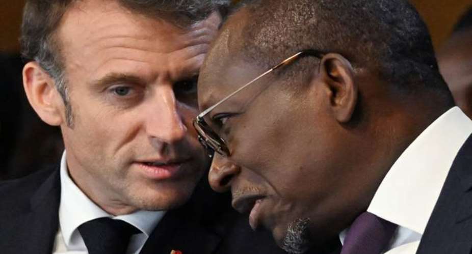 French President Emmanuel Macron with his Beninese counterpart Patrice Talon in Paris on June 22, 2023.*_Source:  EMMANUEL DUNAND/POOL/AFP