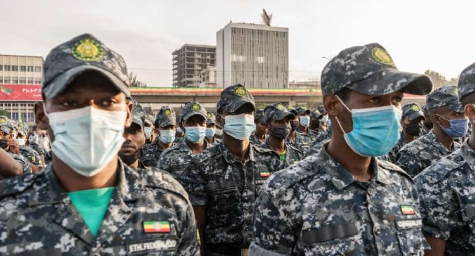 Federal officers stand guard in Addis Ababa, Ethiopia, on September 6, 2021, during a ceremony held to support the Ethiopian military. CPJs annual prison census found the country to be second-worst jailer of journalists in sub-Saharan Africa (AFP/Amanuel Sileshi)