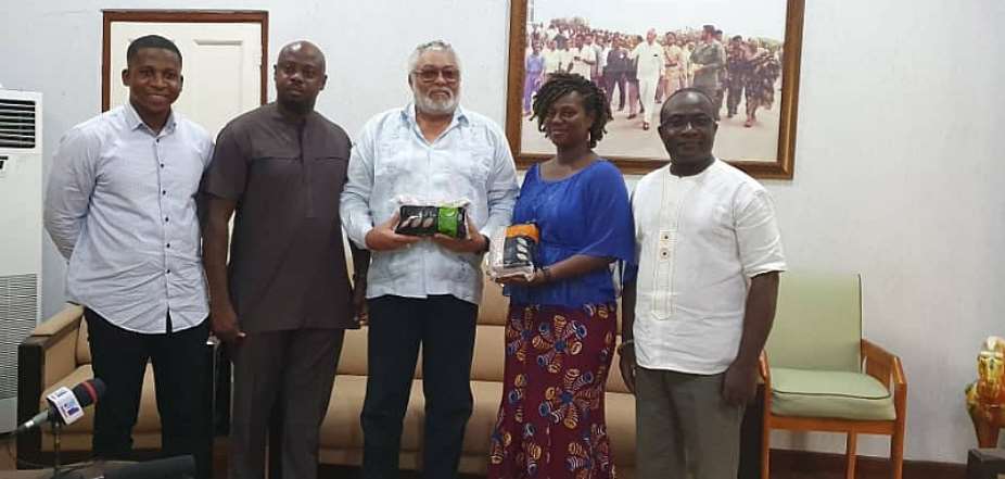 Former President Jerry John Rawlings middle