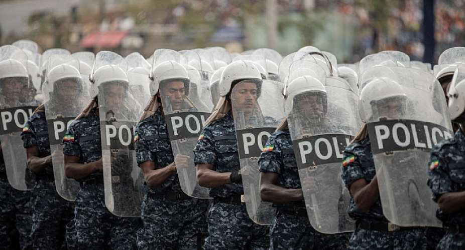 Ethiopian federal police officers march during a ceremony in Addis Ababa, Ethiopia, on June 5, 2022. (AFP/Amanuel Sileshi)