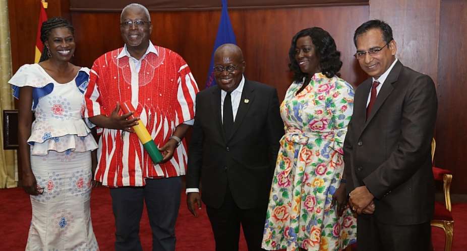 H.E. Nana Akufo-Addo, President of the Republic and Prof. Fred McBagonluri, President of Academic City (2nd from left) in a picture with reps of the university