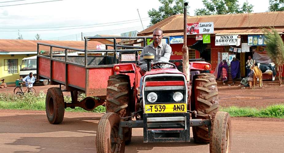 A Tanzanian farmer tractor driver in Makuyuni, Arusha, Tanzania. - Source: Shutterstock