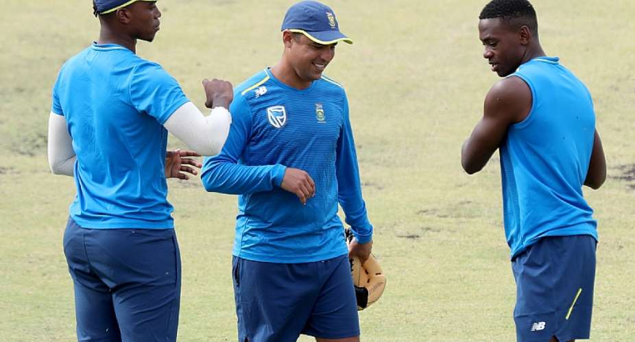 From left, Lungi Ngidi, fielding coach Justin Ontong and Kagiso Rabada of the South African cricket team during a training session ahead of a 2018 test match in Australia - Source: AAPRichard Wainwright