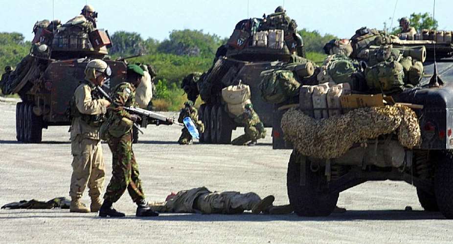 Kenyan military troops and US marines carry out a joint military exercise in Manda Bay near the coastal town of Lamu. - Source: EPASimon Maina