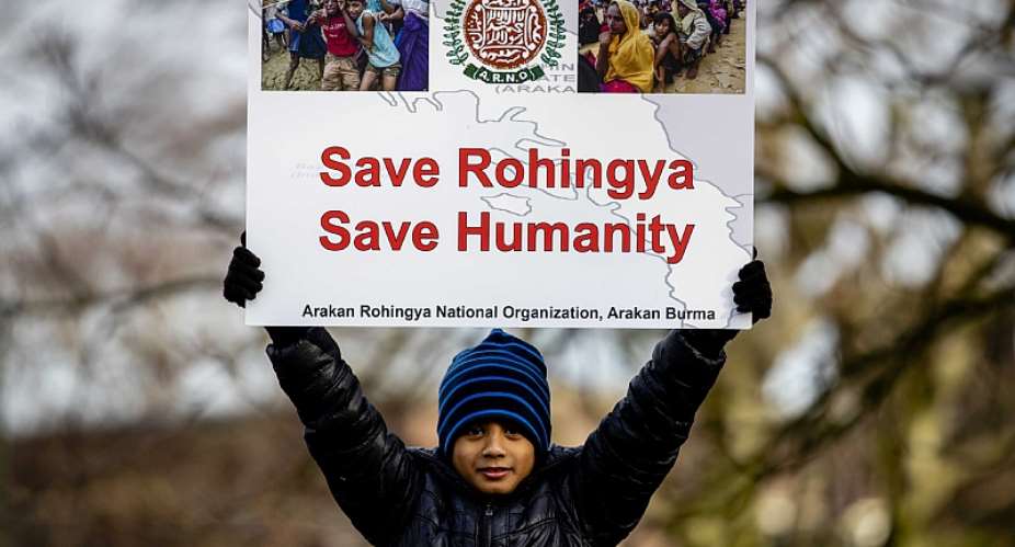 A protester supports the Rohingya outside the Peace Palace in The Hague, Netherlands, on 10 December 2019.  - Source: EPA-EFESem van der Wal