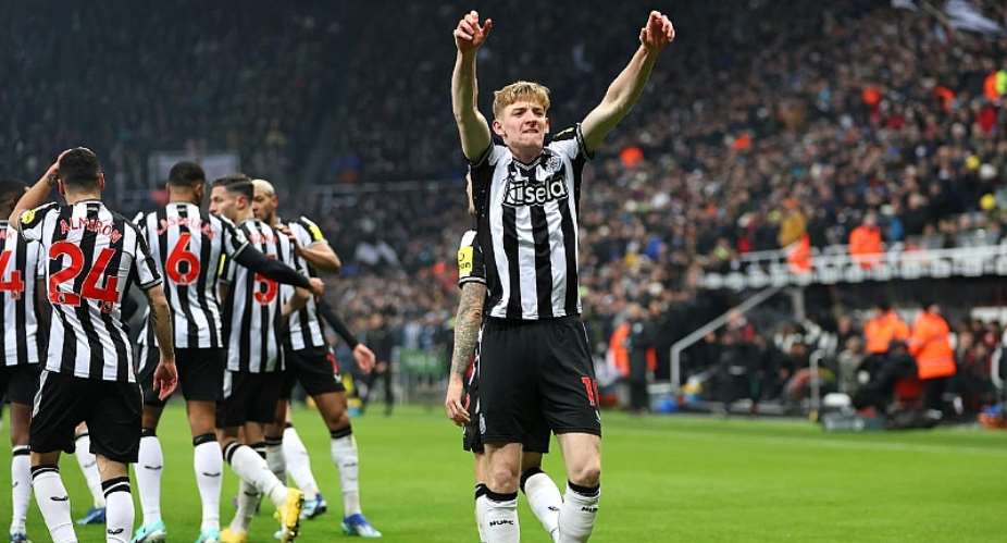 Anthony Gordon of Newcastle United celebrates after scoring the team's first goal during the Premier League match between Newcastle United and Manchester United at St. James Park on December 02, 2023 in Newcastle upon Tyne, England.Image credit: Getty Images