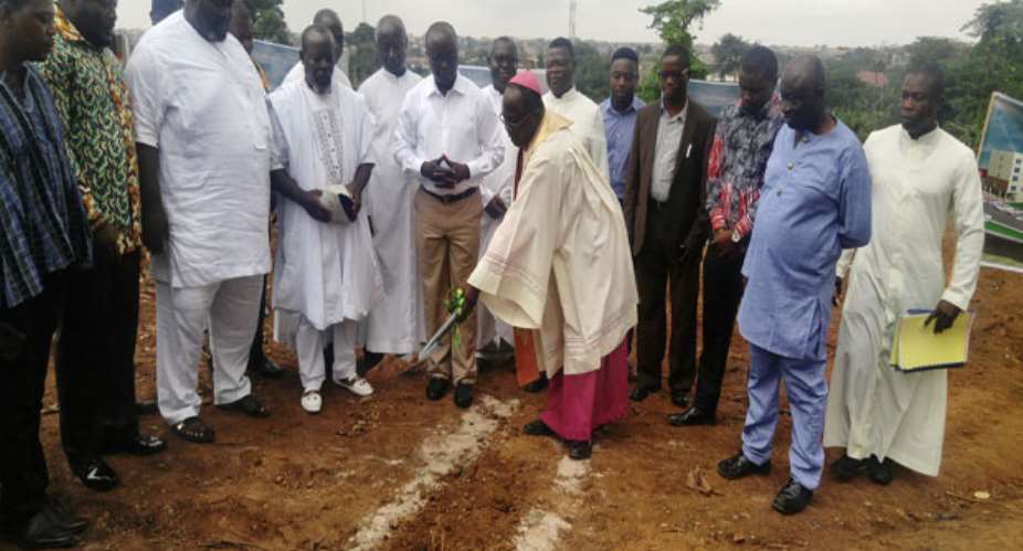 Most Rev Anokye With KMA Boss Cutting The Sod Copy
