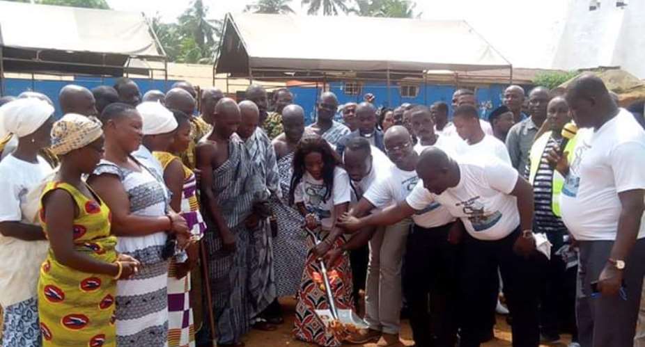 Tourism Minister, Hon. Catherine Afeku performing the sod cutting ceremony with some members of government and Chiefs