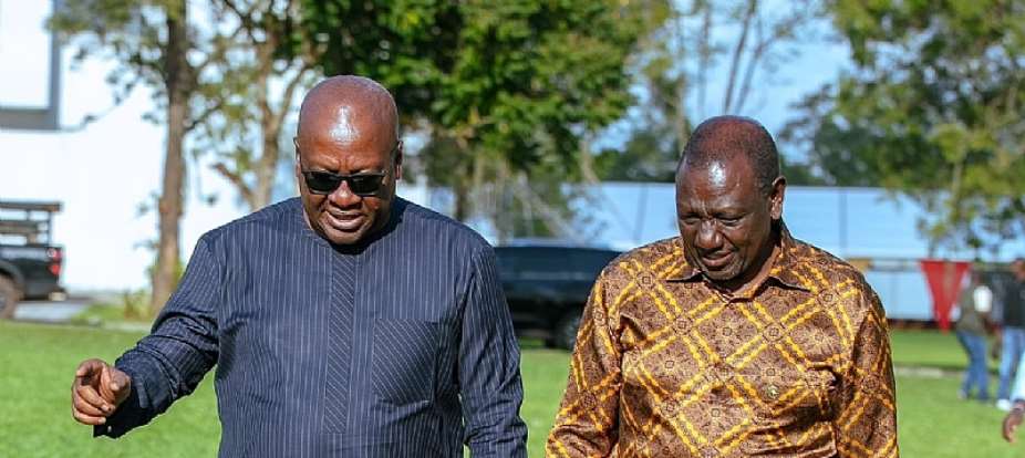 Ghanas President-elect, John Dramani Mahama Left with Kenya President William Ruto Right