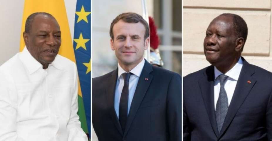 Guinea's Alpha Conde left, French President Emmanuel Macron Middle, and Ivory Coast's Alassane Ouattara right