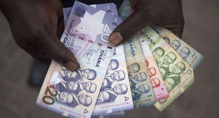 Cedi ends 2024 at GHS15.11 to $1, GHS14.72 on BoG interbank