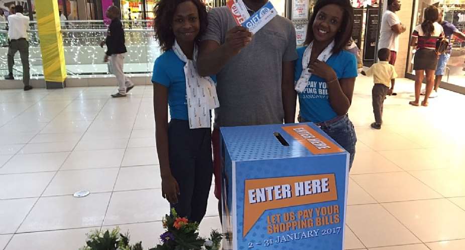 A Happy Shopper Middle Shows Off A Bunch Of Shopping Vouchers He Won In The Pay Your Bill Promo