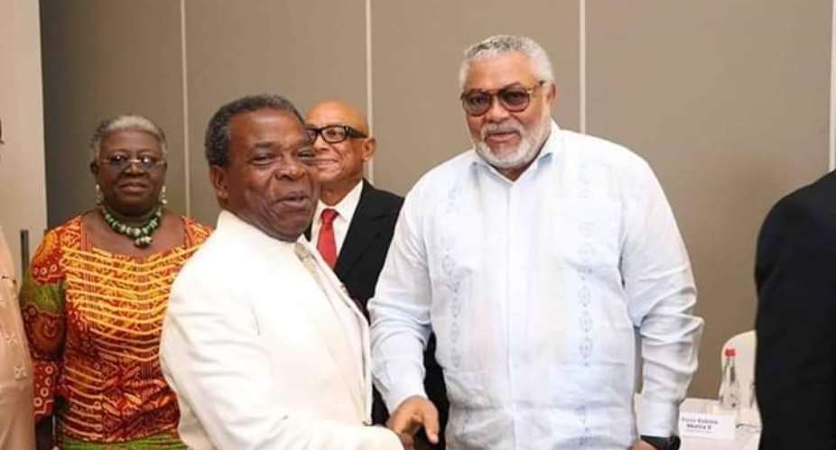 Mr. Rawlings left in a handshake with Mr. Emile Short, the Chairman for the EC's Advisory Committee