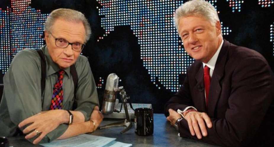 Larry King left with former US President Bill Clinton