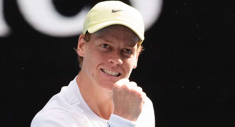 Sinner dismisses health fears to reach semis