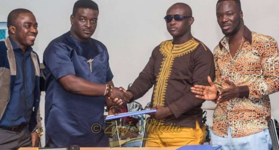 Kumi Guitar bags $100K, house and car in new deal