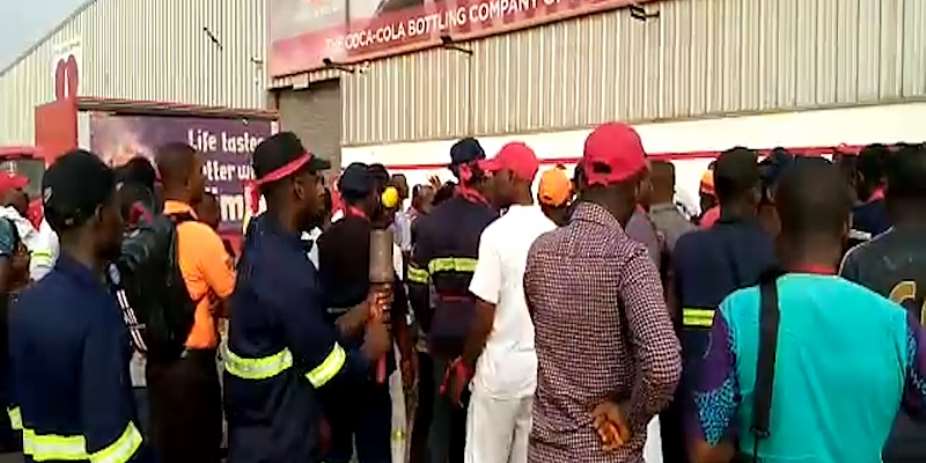 Angry Workers Of Coca-Cola Ghana Want Sacked MD Back