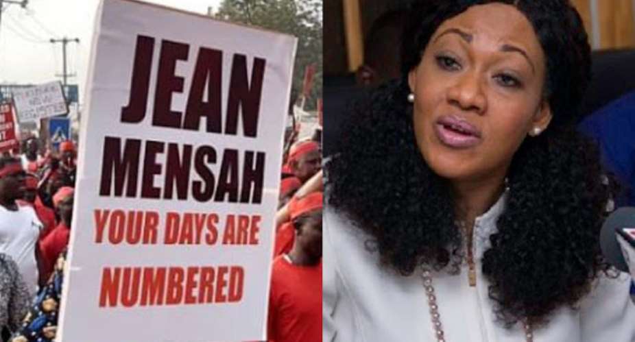 A placard of a threat to the head of the Electoral Commission, Madam Jean Mensah