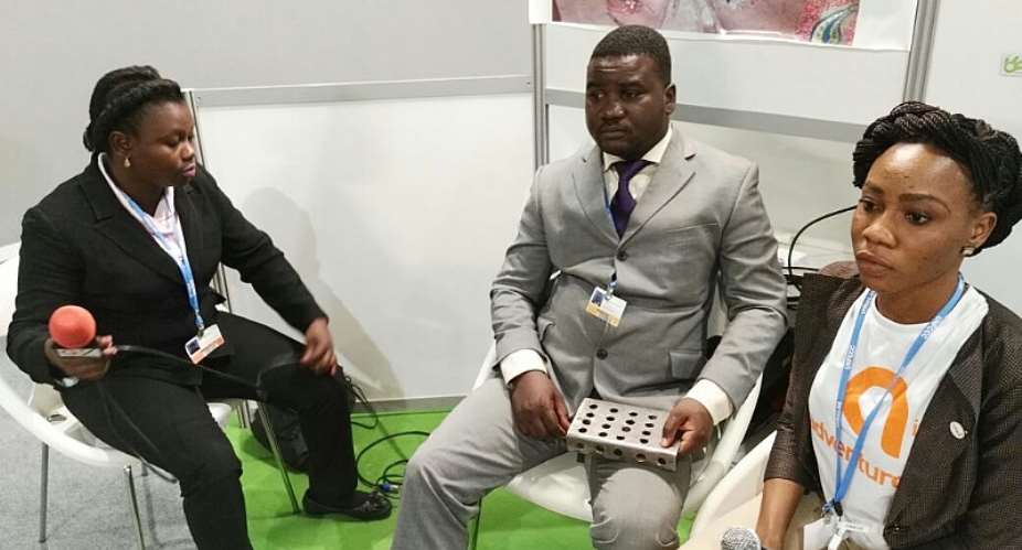 Kenneth Nana Amoateng, Middle, With One Of The Products During Last Year's COP22 Climate Change Conference In Morocco