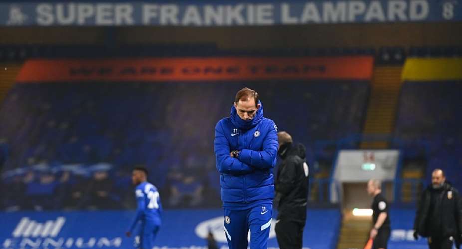 Thomas Tuchel the head coach  manager of Chelsea looks on with a banner for former head coach  manager Frank Lampard above him during the Premier League match between Chelsea and Wolverhampton Wanderers at Stamford Bridge on January 27, 2021 in London,Image credit: Getty Images