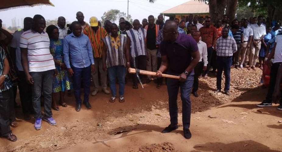 Bryan Acheampong digging the grounds as Nana Aseidu Agyemang, the DCE and others look on