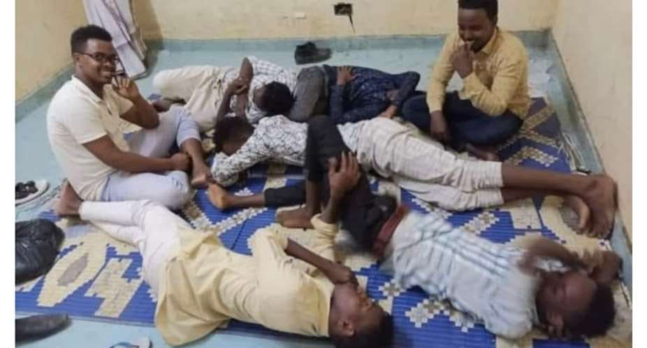 The seven Hiiraan Weyn journalists in detention at the police station after a raid on their radio station. (Credit: Federation of Somali Journalists)