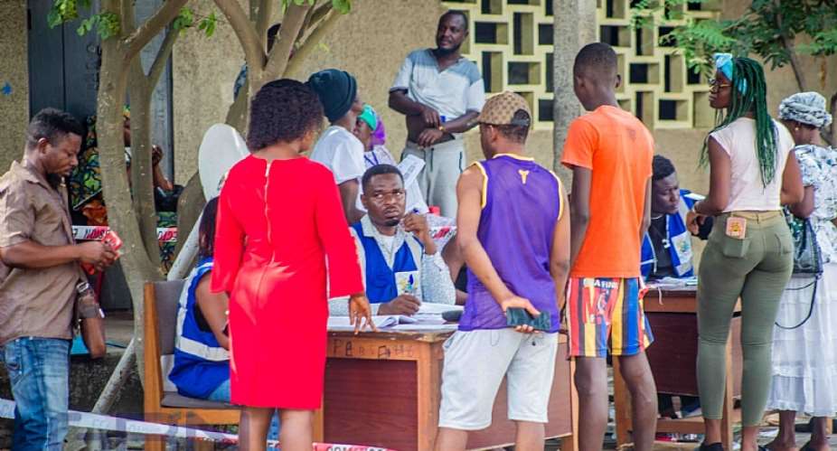 A file photo of some Ghanaians queuing to vote in an election