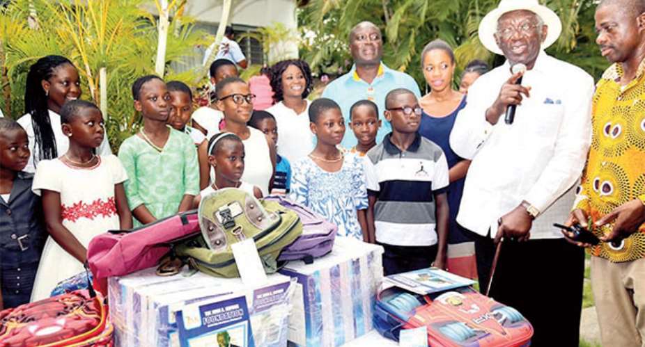 JA Kufuor addressing the Asiakwa SOS Village kids yesterday