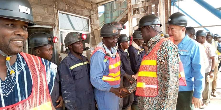 Minister for Lands and Natural Resources interacting with miners at Gbane