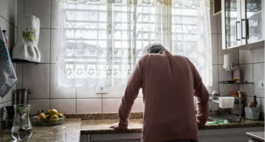 Senior man feeling pain at home