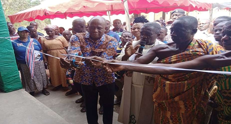 Hon. Augustine Ntim, the MP performing the tape cutting
