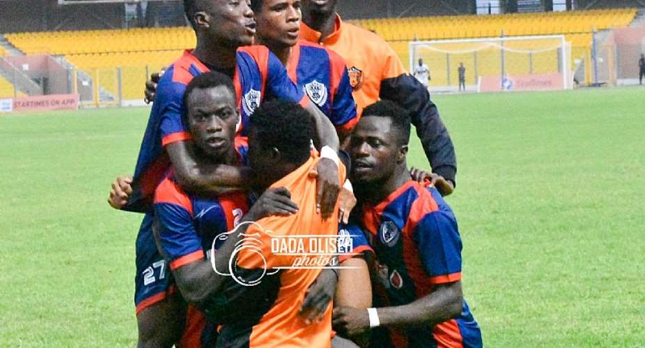 Legon Cities FC players celebrating a goal against Bechem United in the Ghana Premier League