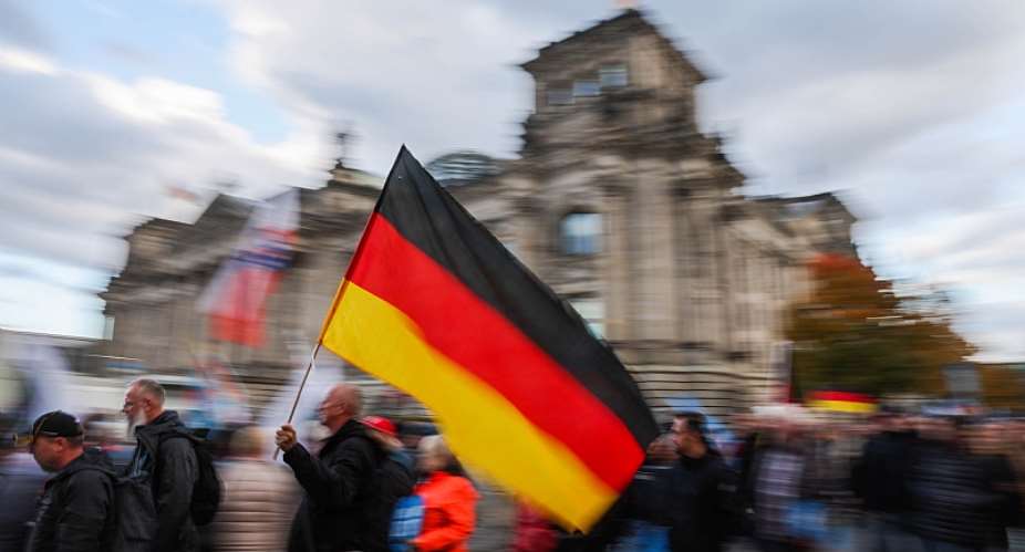 On February 23, Germany elects a new Bundestag. The issue of migration plays a particularly important role, not least for supporters of the far-right AfD party - seen here at a demonstration in front of the Reichstag building in Berlin, the seat of the Bundestag, in 2022. (Photo by Christoph Soeder/dpa)