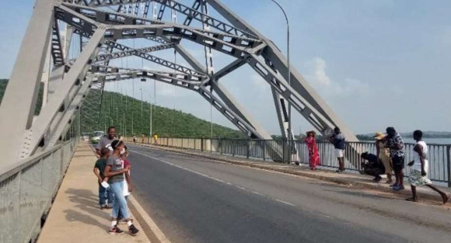 Internal tourists call for parking space at Adomi Bridge