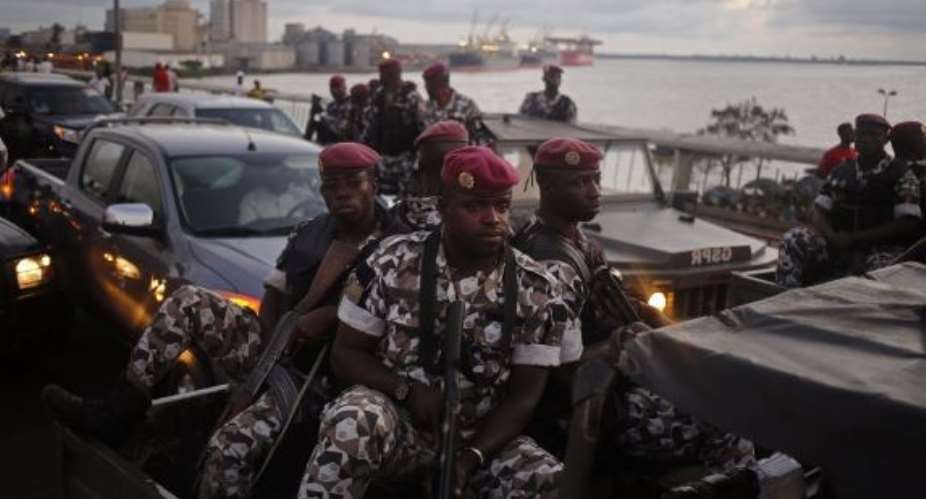 Soldiers mutiny in 3 Ivory Coast cities over pay