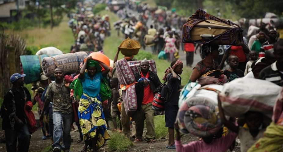 Congolese refugees fleeing from Ebola and violence to neighbouring Uganda