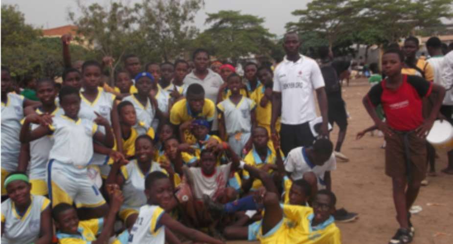 Tema Community 2 No 4 Primary School Pupils With A Denkyem Official.