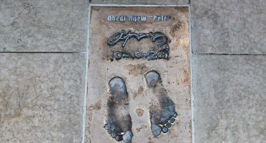 Abedi Pel footprints posed on Montecarlo's Champions Promenade